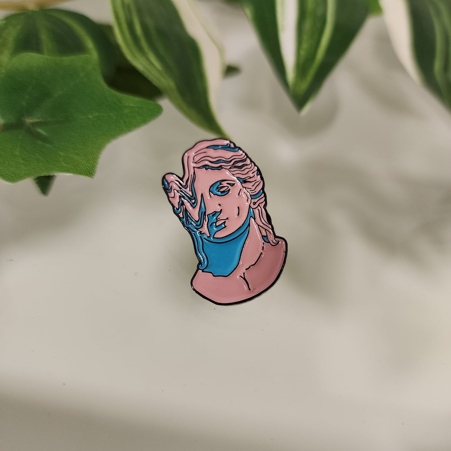 Pin David Derritiendose