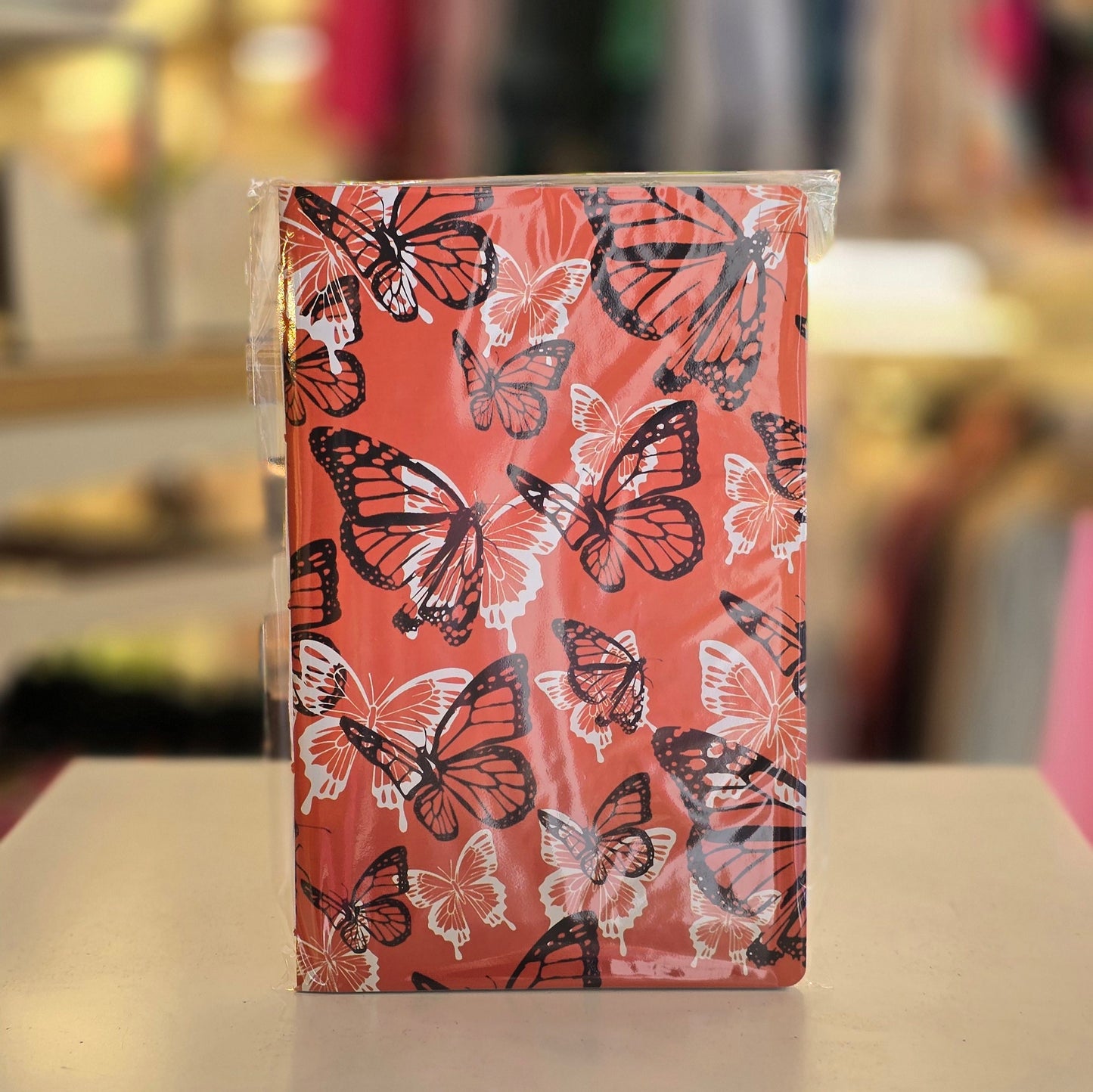 Libreta Delgada Naranja con Mariposas