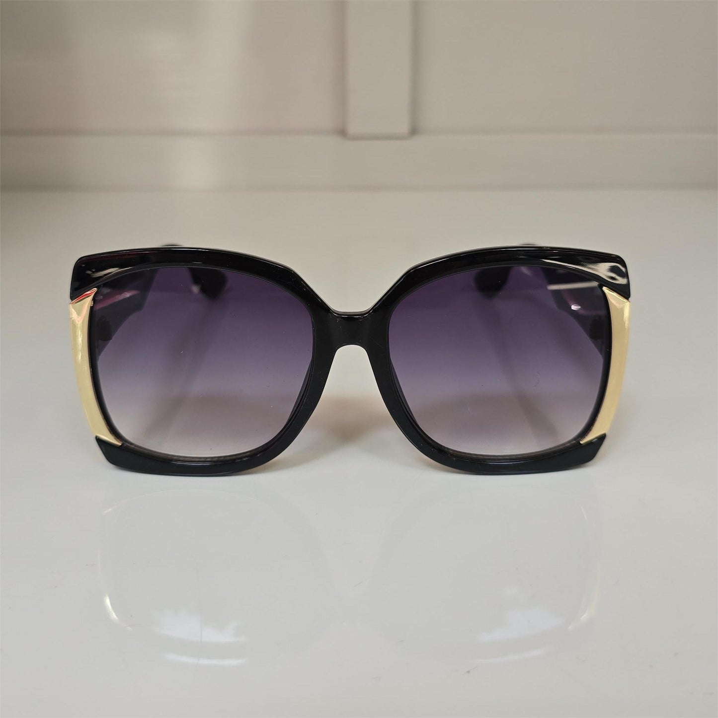 Lentes "Sovereign" en negro y dorado