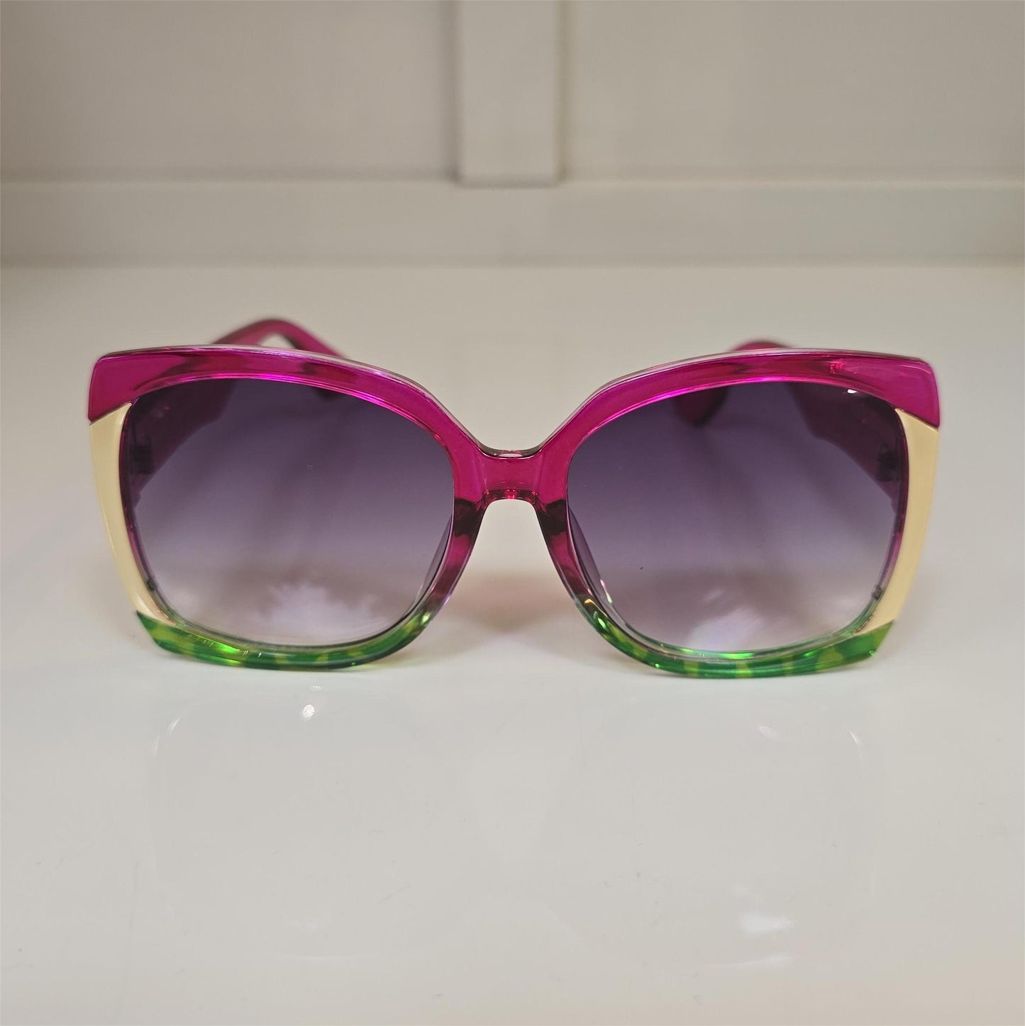 Lentes "Tropikiss" en rosa con verde y detalle dorado