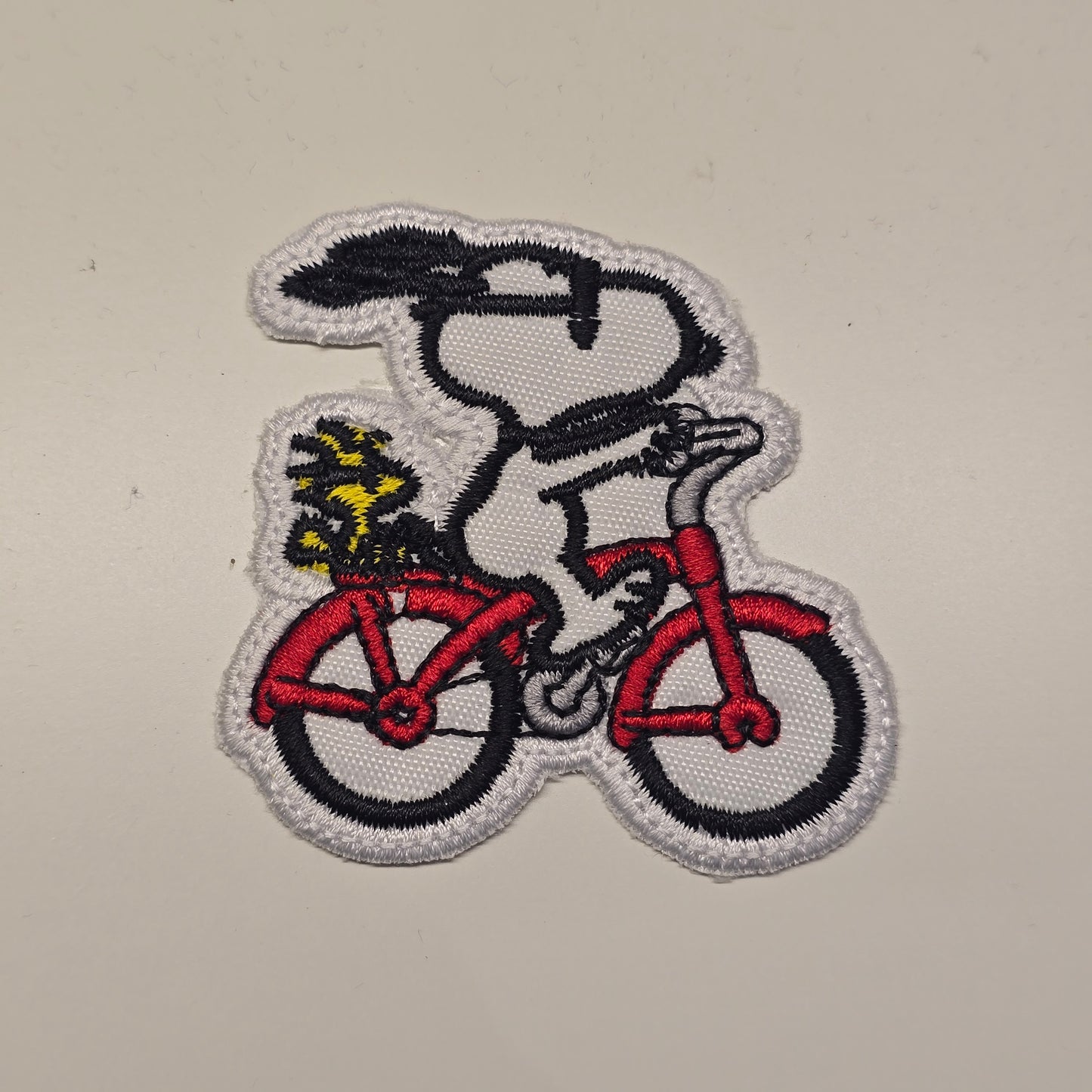 🚴 Parche “Snoopy en bici”