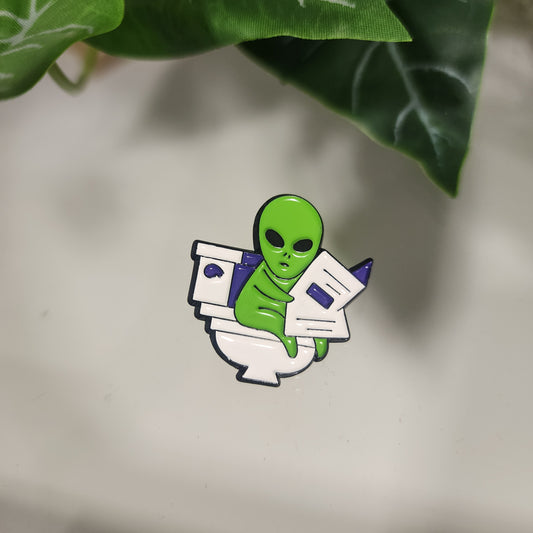 Pin Alien en el Baño