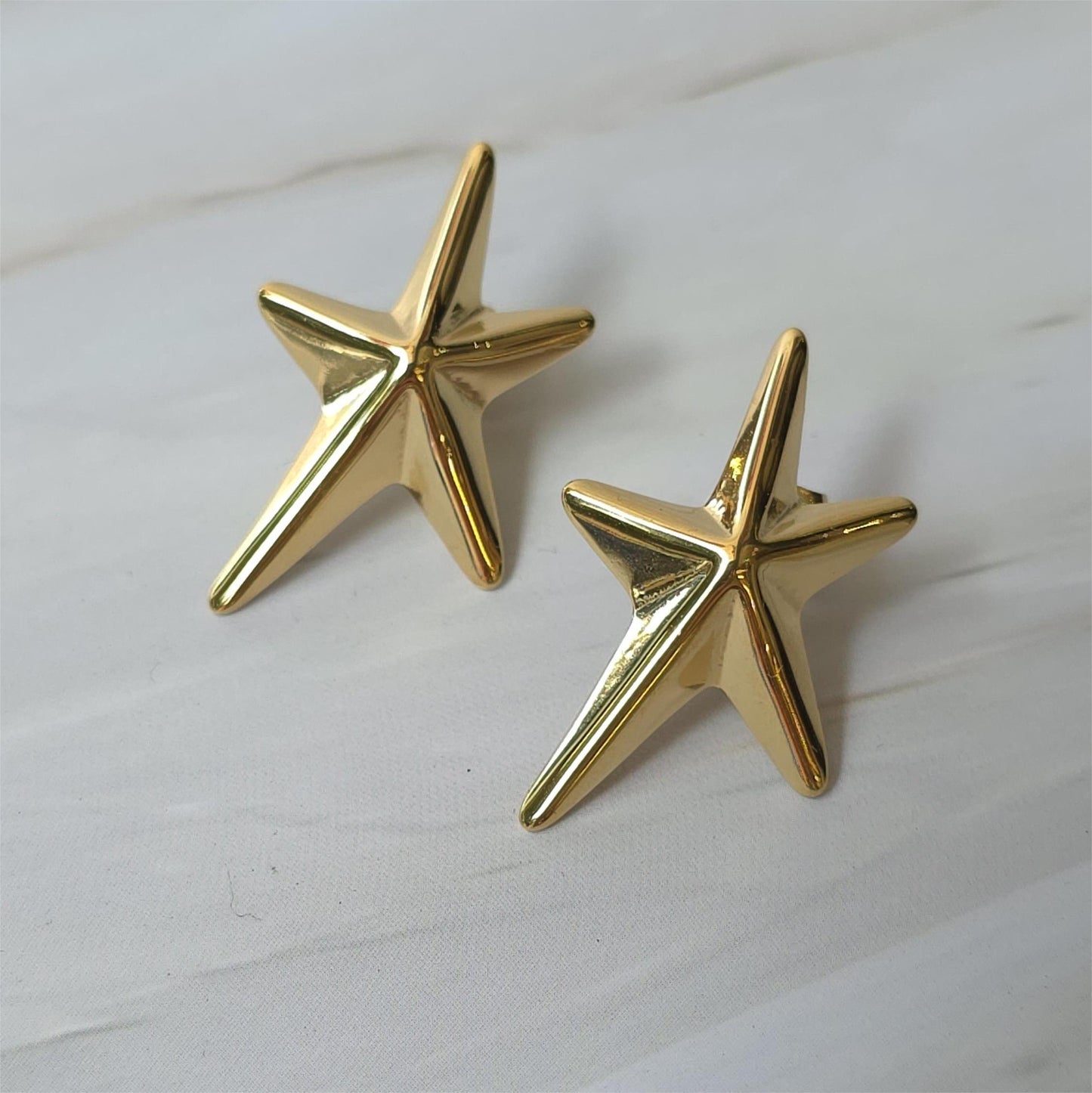 Aretes Estrella Dorada