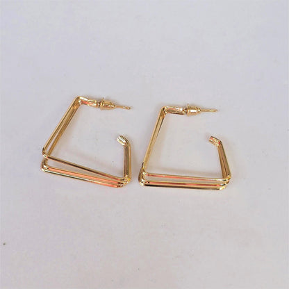 Aretes geométricos – Triángulo dorado doble línea