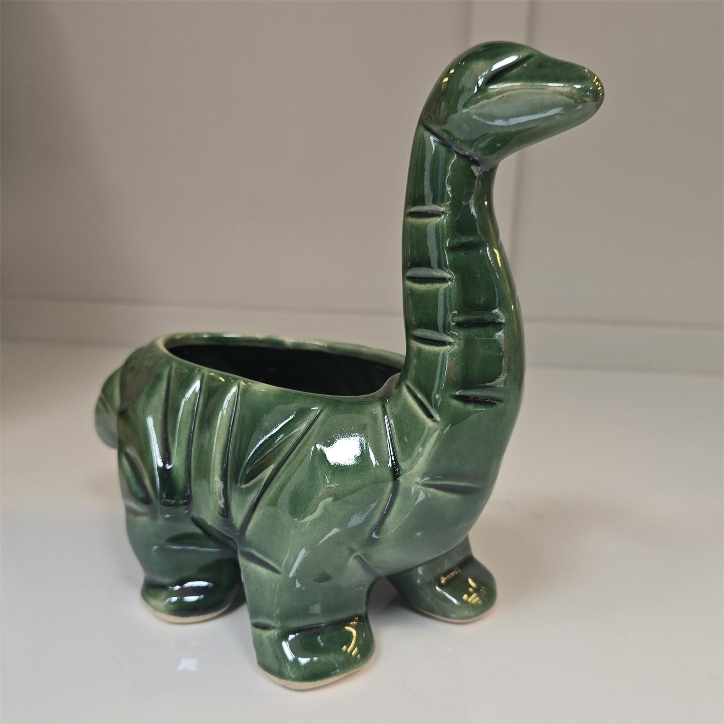 🦕 Maceta Dino de Cerámica – Verde Esmeralda