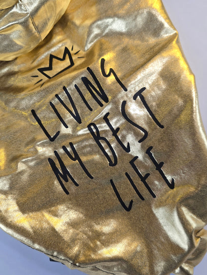 ✨ Chamarra dorada repelente "Living My Best Life"