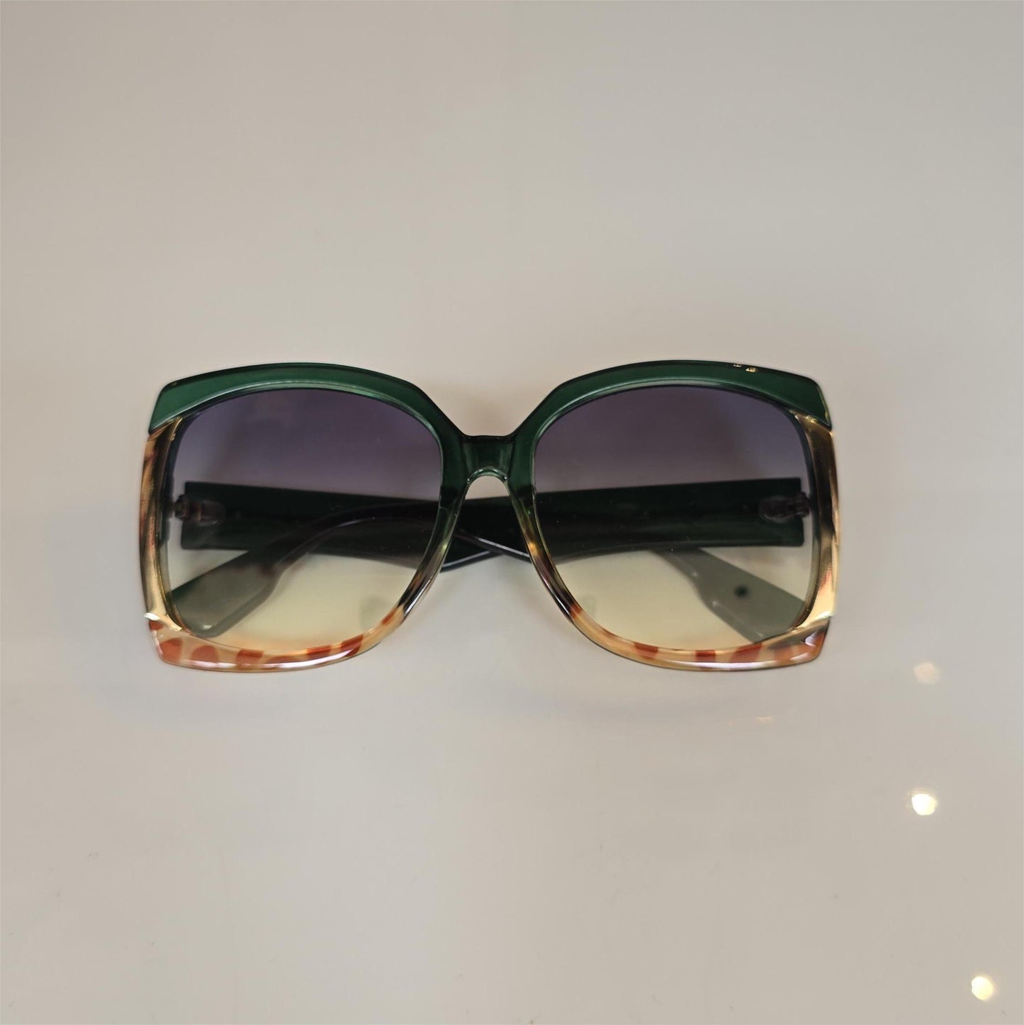 Lentes "Savanna" en verde, dorado y print sutil