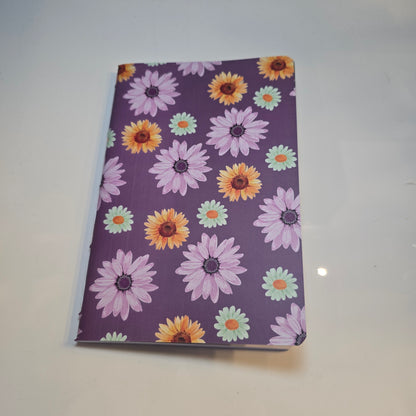 Libreta Delgada Juego de Margaritas