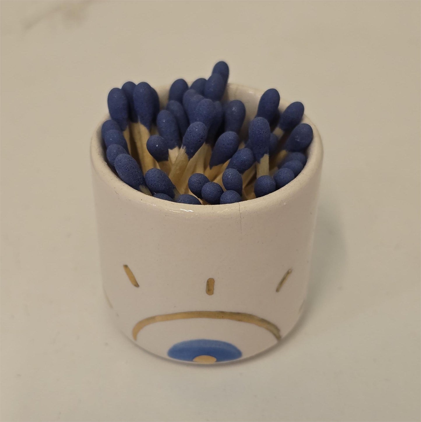 Cerillero de cerámica "Sol radiante"